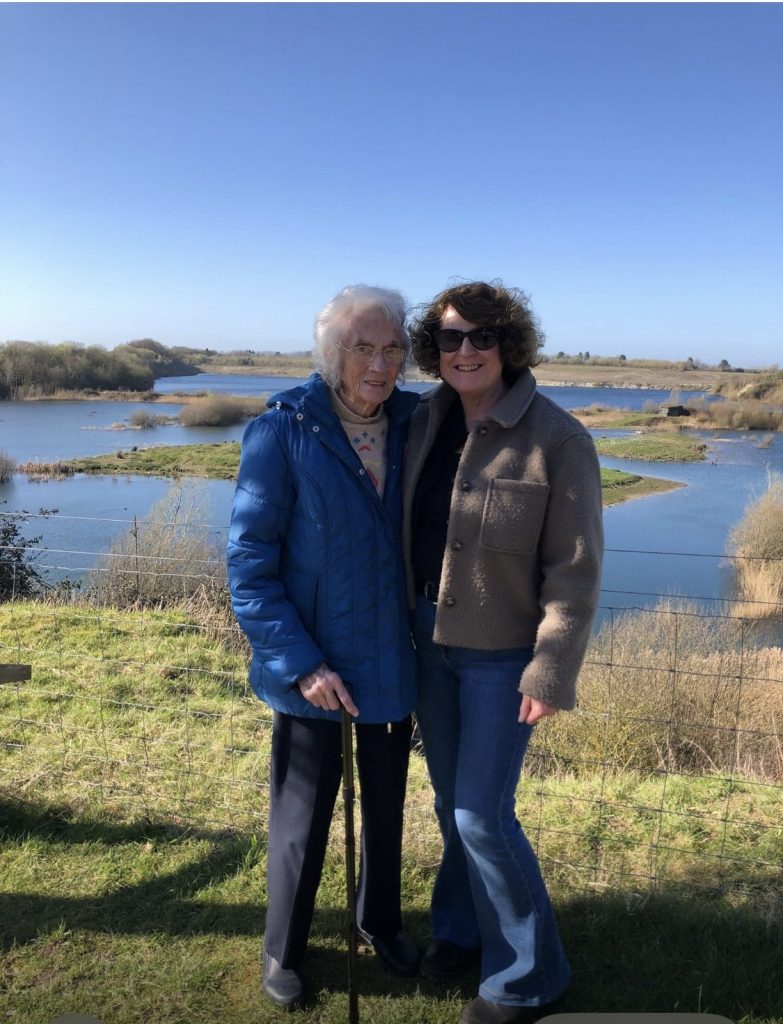 PA Liz and her client enjoying a spring walk together.