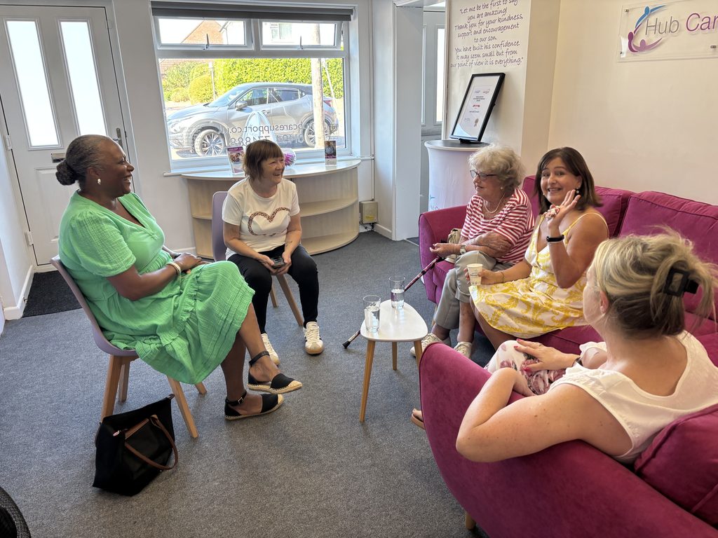 Coffee and chats on our pink sofa